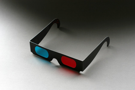 3D Movie Glasses on dark backgroundの写真素材