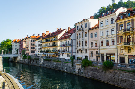 Embankment of Ljubljana historical city center with colorful houses, Sloveniaの写真素材