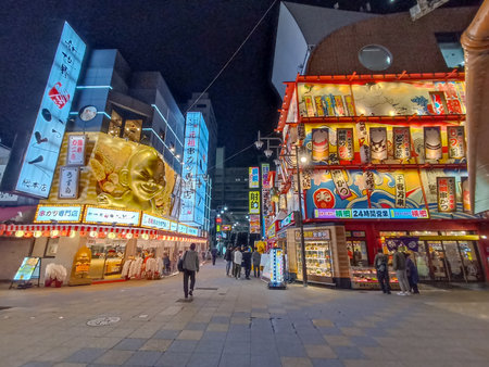 Shinsekai district illuminated at night, Osaka, Japanの写真素材