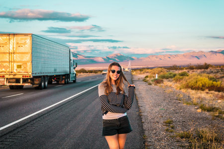 Photo of Girl at Mojave Desert near Route 66 in Californiaの写真素材