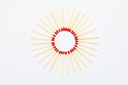 match stick circle central on white backgroundの写真素材