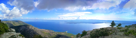 A twisted panorama of a wonderful place in croatia. A view of the coastline on isle brac.の写真素材