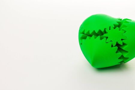 a green 3d printed heart on a white backgroundの写真素材