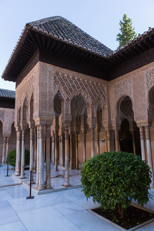Beautiful Moorish arches in main courtyard of the Nasrid dynasty Palace of the Lions in fortress complex Alhambra in Granada. Spainのeditorial素材