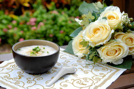 Breakfast in the garden, Rice porridge, Congee (famous breakfast in Thailand)の写真素材