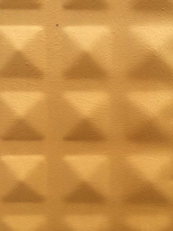 Yellow squares on metal surface backgroundの素材