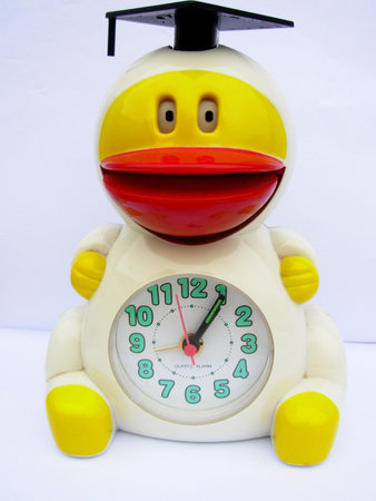 an duck alarm clock with white background close up