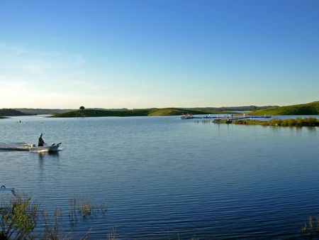 Small fishing boat in the Guadiana river, Portugalの写真素材
