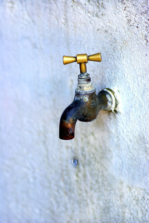 Old brass dripping faucet,Dripping Tap.