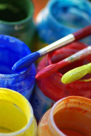 Color bottles and brushes for artistic paintings.の写真素材