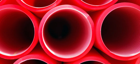 Red plastic tubes.の写真素材