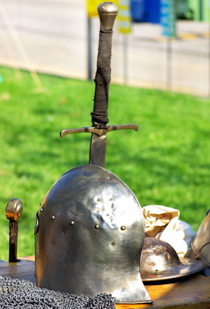 Medieval helmet and swords.