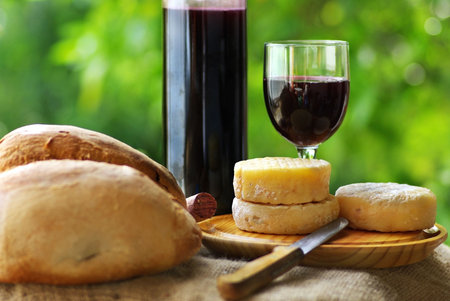 Bread, cheese and red wine.の写真素材