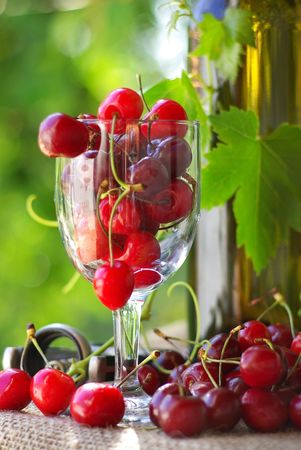 White wine and cherries.の写真素材