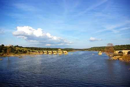 Old bridge of Ajuda in Guadiana river.の写真素材