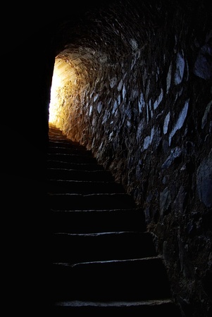 light at end of tunnel in portuguese castleの写真素材