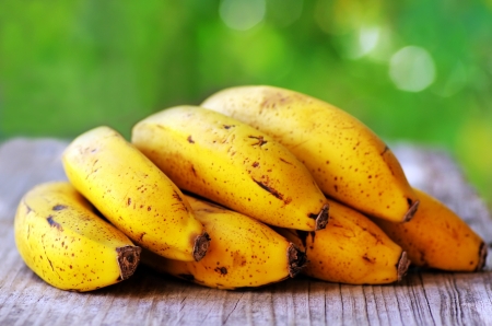 Yellow bananas on tableの写真素材
