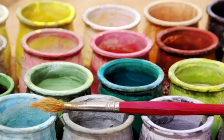 Old brush and colorful bottlesの写真素材