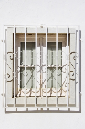  White window on the white old buildingの写真素材