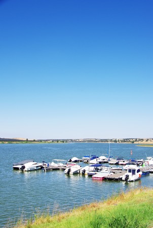 Boats in Alqueva dam near Olivenza, Spainのeditorial素材