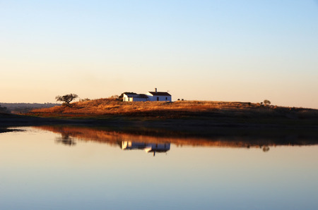 house and lake of alqueva, south of Portugalの写真素材
