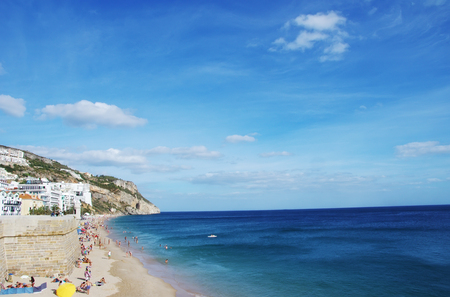 view on the coastal town of Sesimbra with beach in Portugalの写真素材
