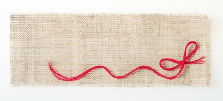 sackcloth tags with decor over whiteの写真素材