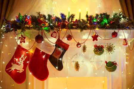 Christmas Fireplace, Family Hanging Socks, Xmas Lights Decoration, Tree Branchesの写真素材
