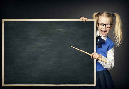 School Child with Pointer, Kid Girl Peek Blackboard, Learning and Education Advertisementの写真素材