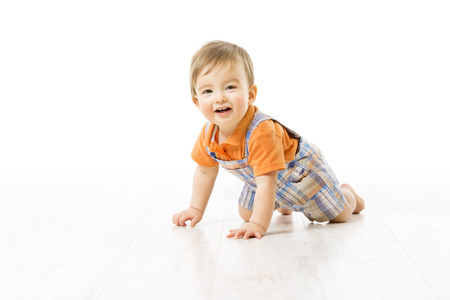 Crawling Baby, Infant Kid Crawl on white floor, Happy One year old Childの写真素材
