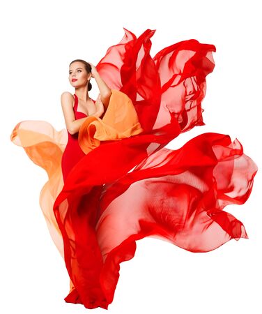 Woman Waving Red Dress Fluttering as Flame, Flowing Silk Cloth, Beautiful Fashion Model in Artistic color Fabric on Whiteの写真素材