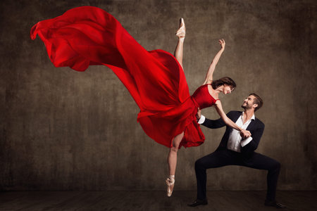 Ballet Couple Dance, Beautiful Woman in Red Dress and Man in Suit, Ballerina in Fluttering Flying...