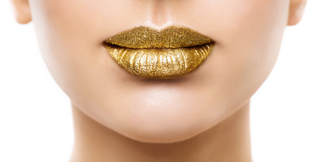 Golden Lips Make up Close up. Gold Beauty Woman Glitter Lipstick Gloss Makeup. Luxury Face Cosmeticの写真素材