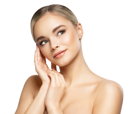 Woman Beauty with Clean Fresh Skin look up. Beautiful Girl Face Care. Model with Natural Makeup over White. Facial Treatment and Cosmetology. Beauty Spa Salonの写真素材