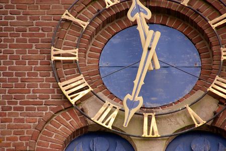 Detail of a clock at a church towerの写真素材