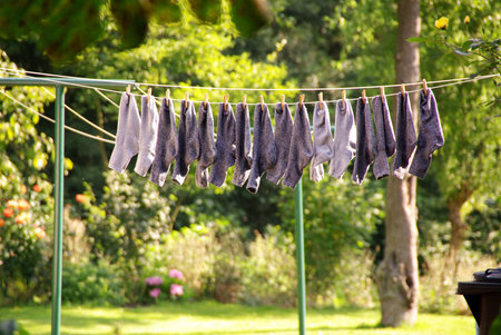 Grey stockings at a clothline