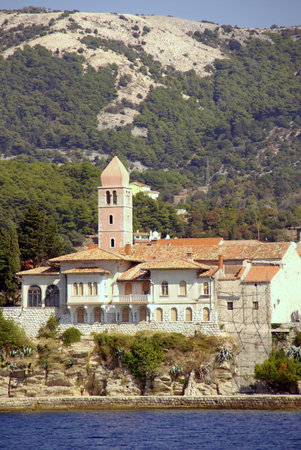 Rab with the bell tower of St John in Croatiaの写真素材