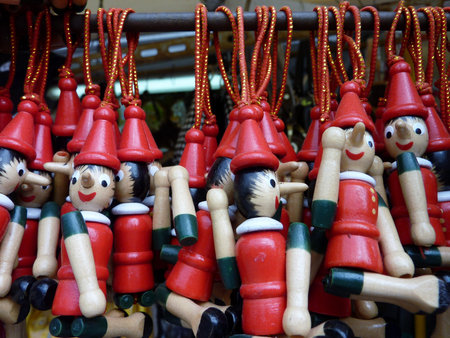 Painted wooden marionette dolls of the figure of Pinochioの写真素材