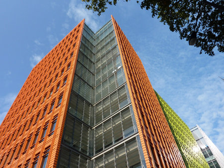 Colorful modern offices buildings opposite a blue sky