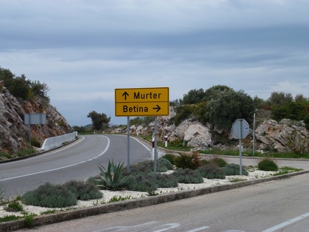 Direction arrows to the villages Murter and Betina on the island Murter in Croatiaの写真素材