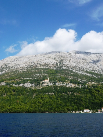 White clouds on the mountain tops of the peninsula Peljesac in Croatia の写真素材
