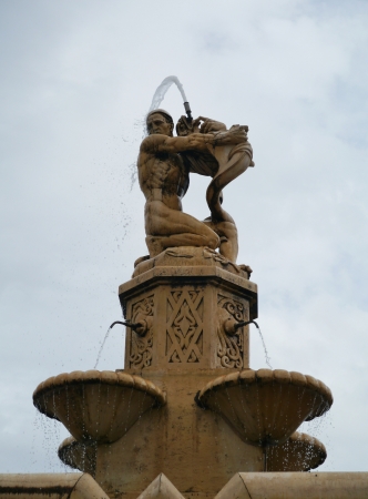 A close up of the monumental fountain on the twentieth September square in Mola di Bari in Apulia in Italyの写真素材