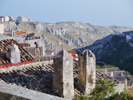 Chimneys on an old house in Monte saint Angelo in Italyの写真素材