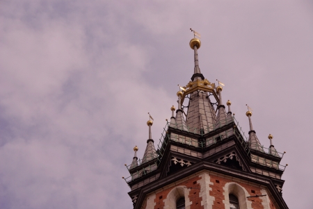 One of the towers of the St Mary church at the market in Krakow in Polandの写真素材