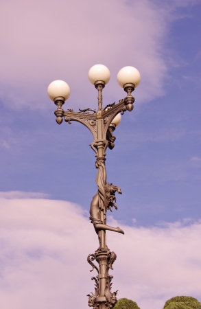 Historical decorated lamppost in Pistoia in Tuscany in Italyの写真素材