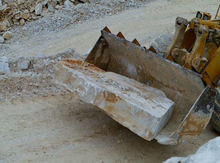 White marble on a shovel in Carrara in Italy