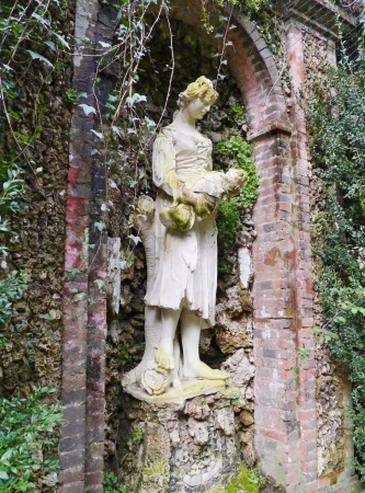 One of the sculptures in the garden of the villa Garzoni in Collodi in Italyのeditorial素材
