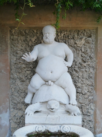 Sculpture of the Bacchino dwarf Morgante riding on a tortoise in de boboli gardens in Florence in Italyの写真素材