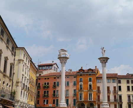 The Lion of St  Mark and Christ the Redeemer columns on the piazza dei signori in Vicenza in Italyの写真素材