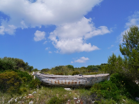 An ancient fishing boat ashore on Lastovo in Croatiaの写真素材